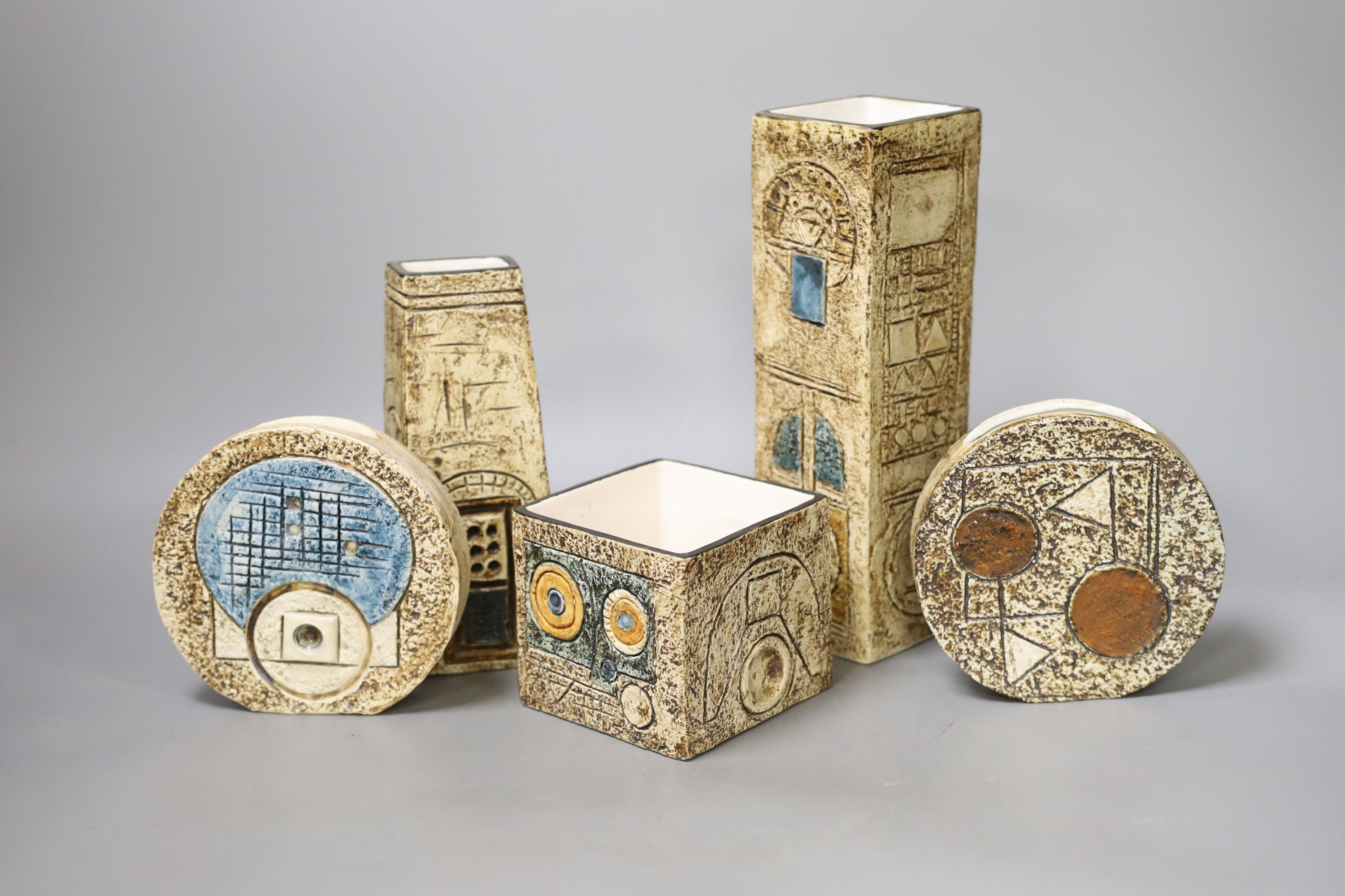 Five Troika vases, comprising two small wheel vases, by AN & SK, a cube vase, a tapering slab vase by EW and a square section vase, by LT, tallest 23cm